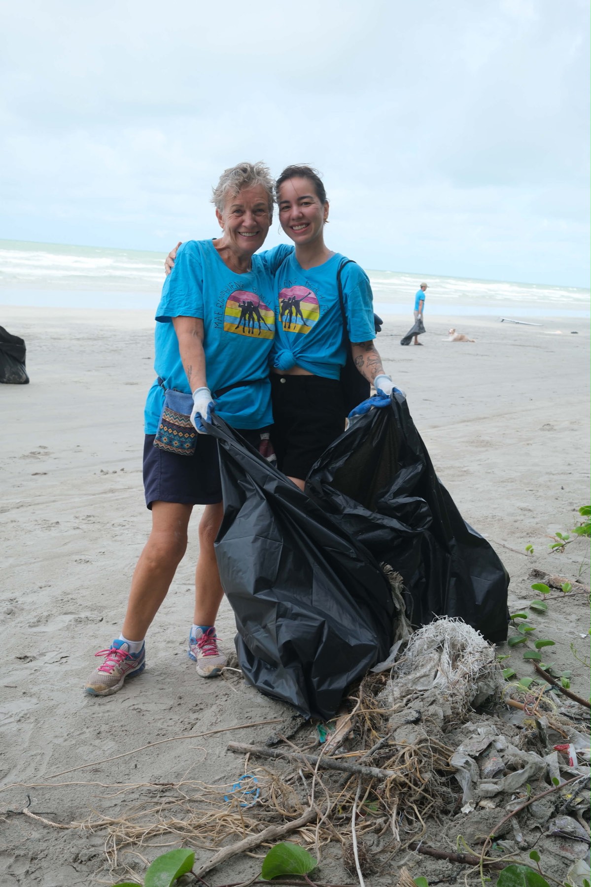 Claire helping with a Mae Ram Phueng beach cleanup in Rayong, Thailand &mdash; the community she&rsquo;ll be opening her deli into.