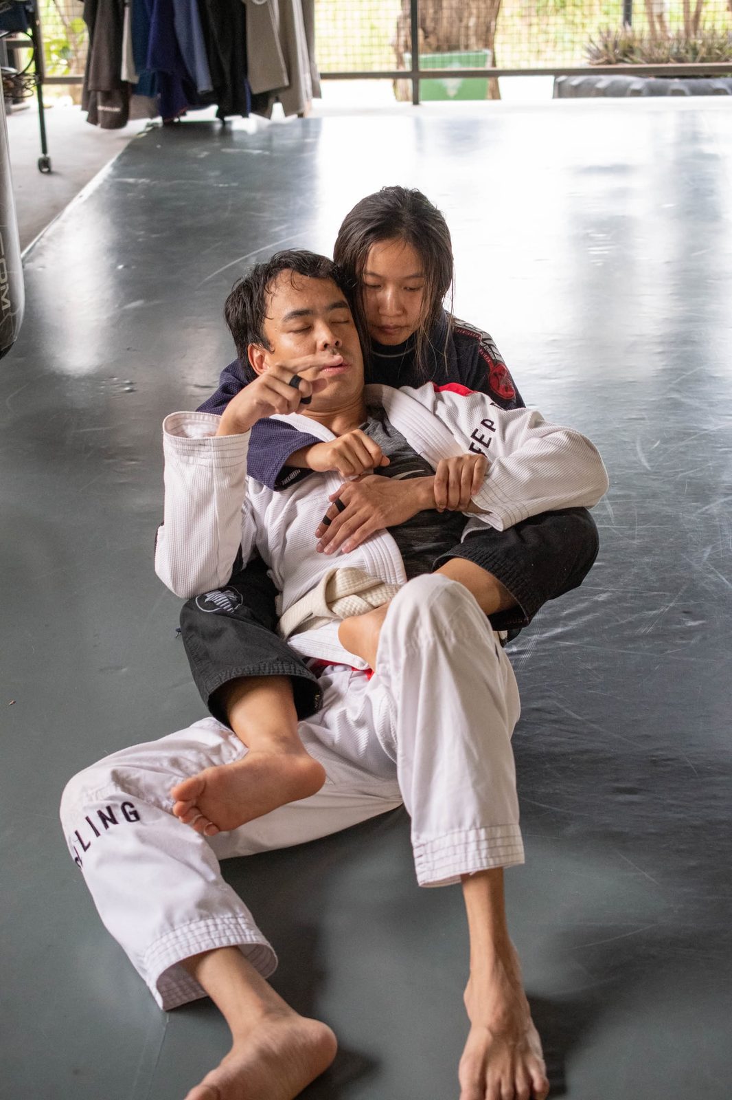 Psy on the mat at Tree Roots Retreat in Rayong, Thailand &mdash; back-control during a Brazilian Jiu-Jitsu session at the Mae Ram Phueng jiujitsu retreat.